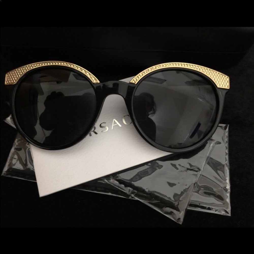 Versace sun glasses. CLEANING MY CLOSET MAKE OFFER
